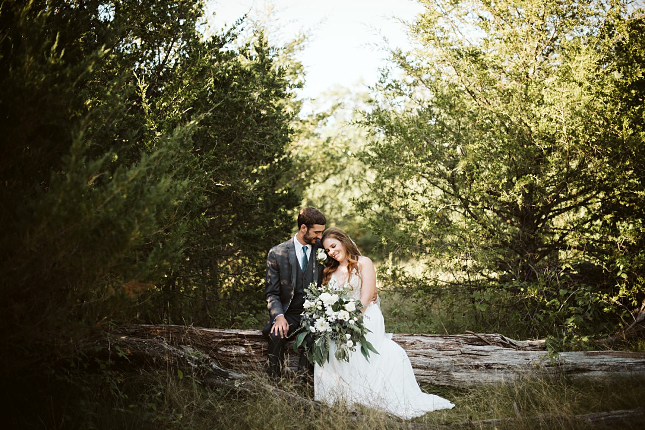 Bride and Groom on a log, Wedding Couple Photos in the woods, Adventure Wedding