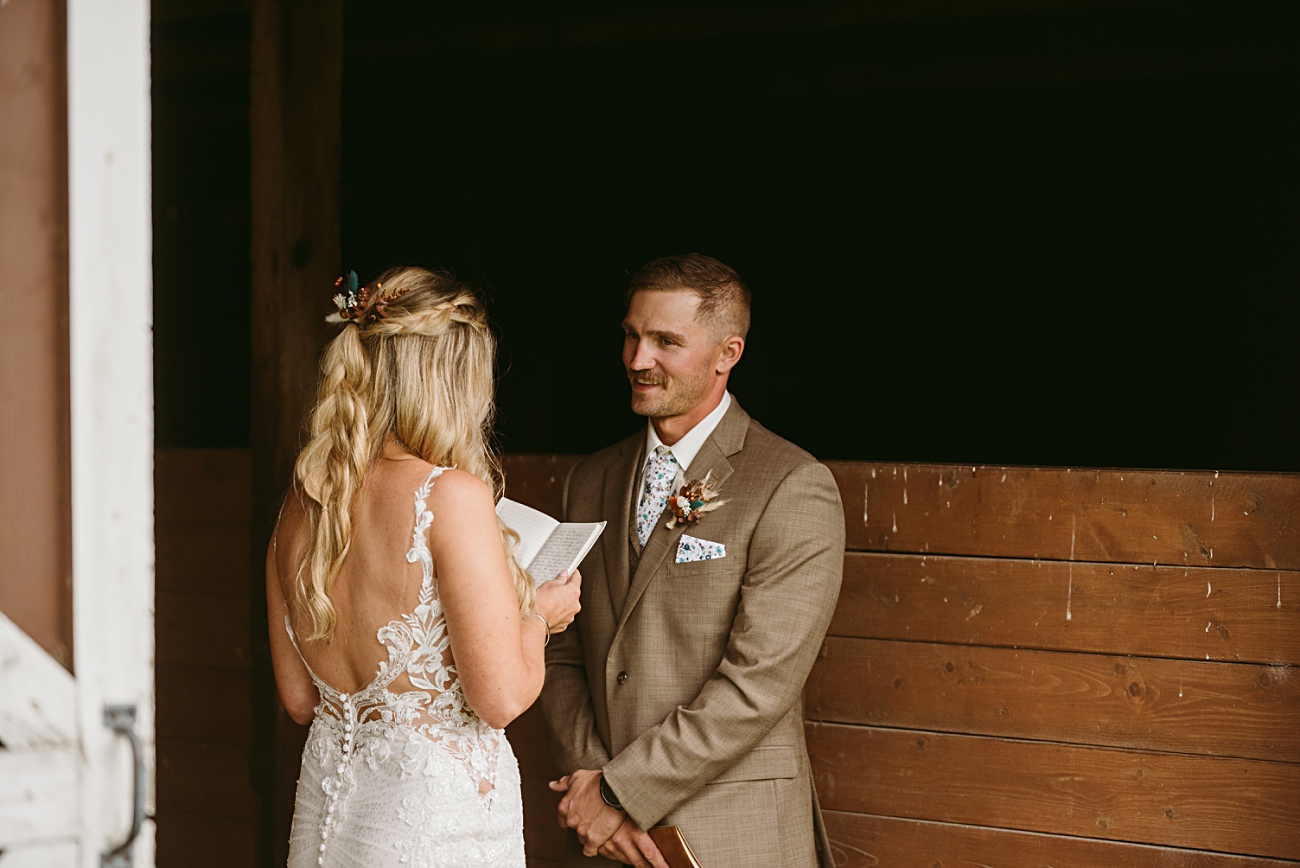 outdoor wedding northern 1st look photos on a rainy wedding dayWisconsin, Wedding with horses